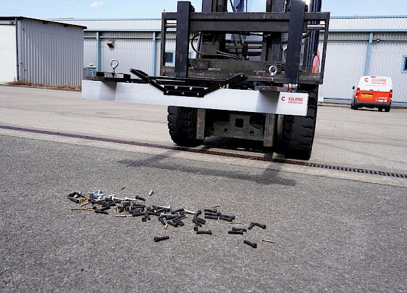 Fork Lift Mounted Magnetic Sweeper with nails on the ground